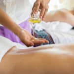 applying oil for massage