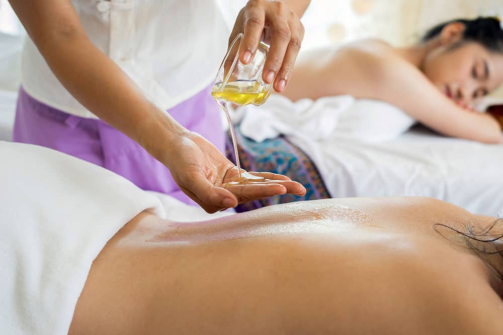 applying oil for massage